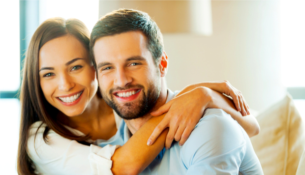 photo of man and woman smiling